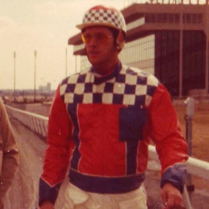 Kimberly’s father in his racing colors at the track